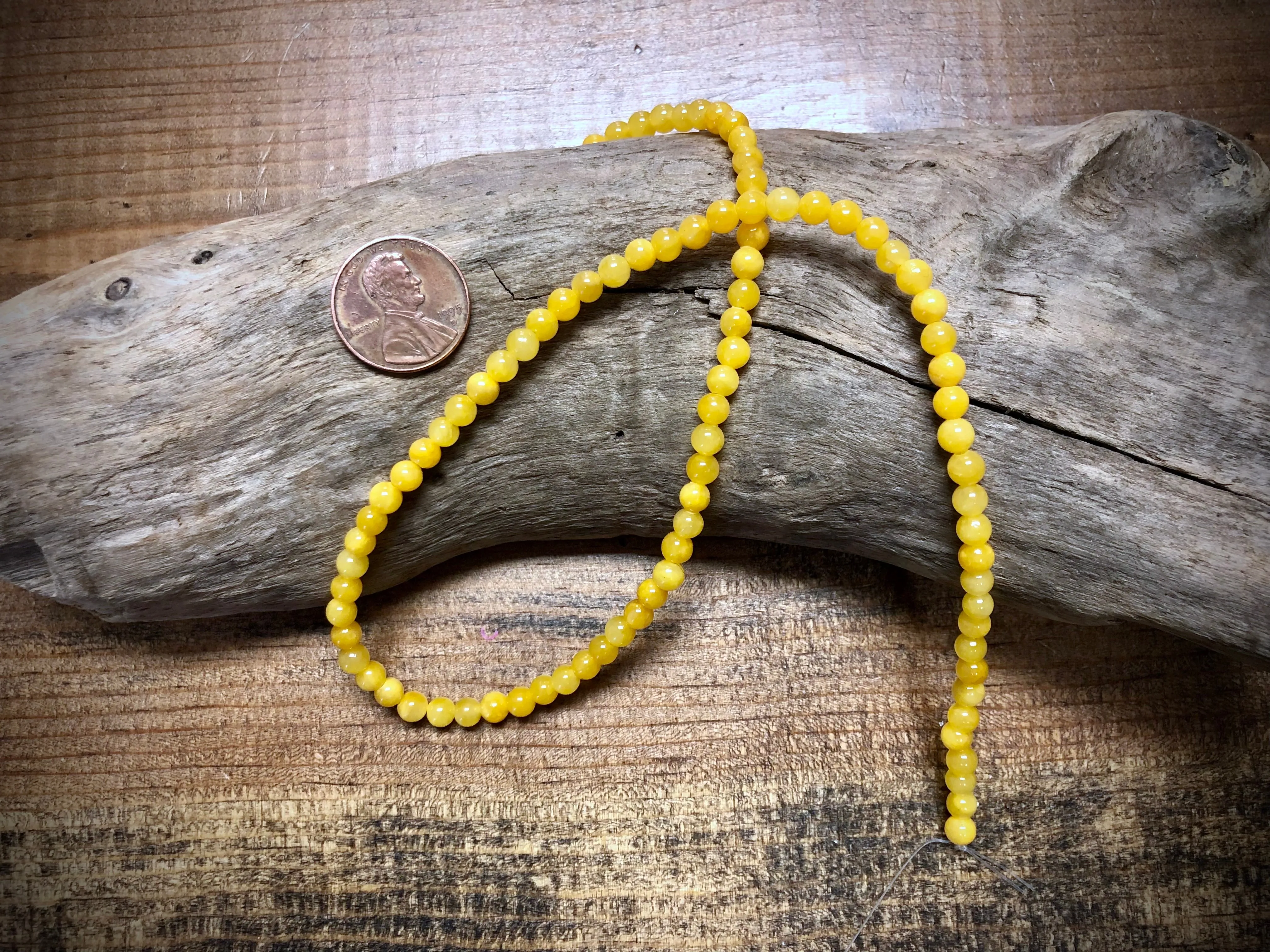 Dyed Jade Smooth Rounds - Yellow - 4mm - 15.5"