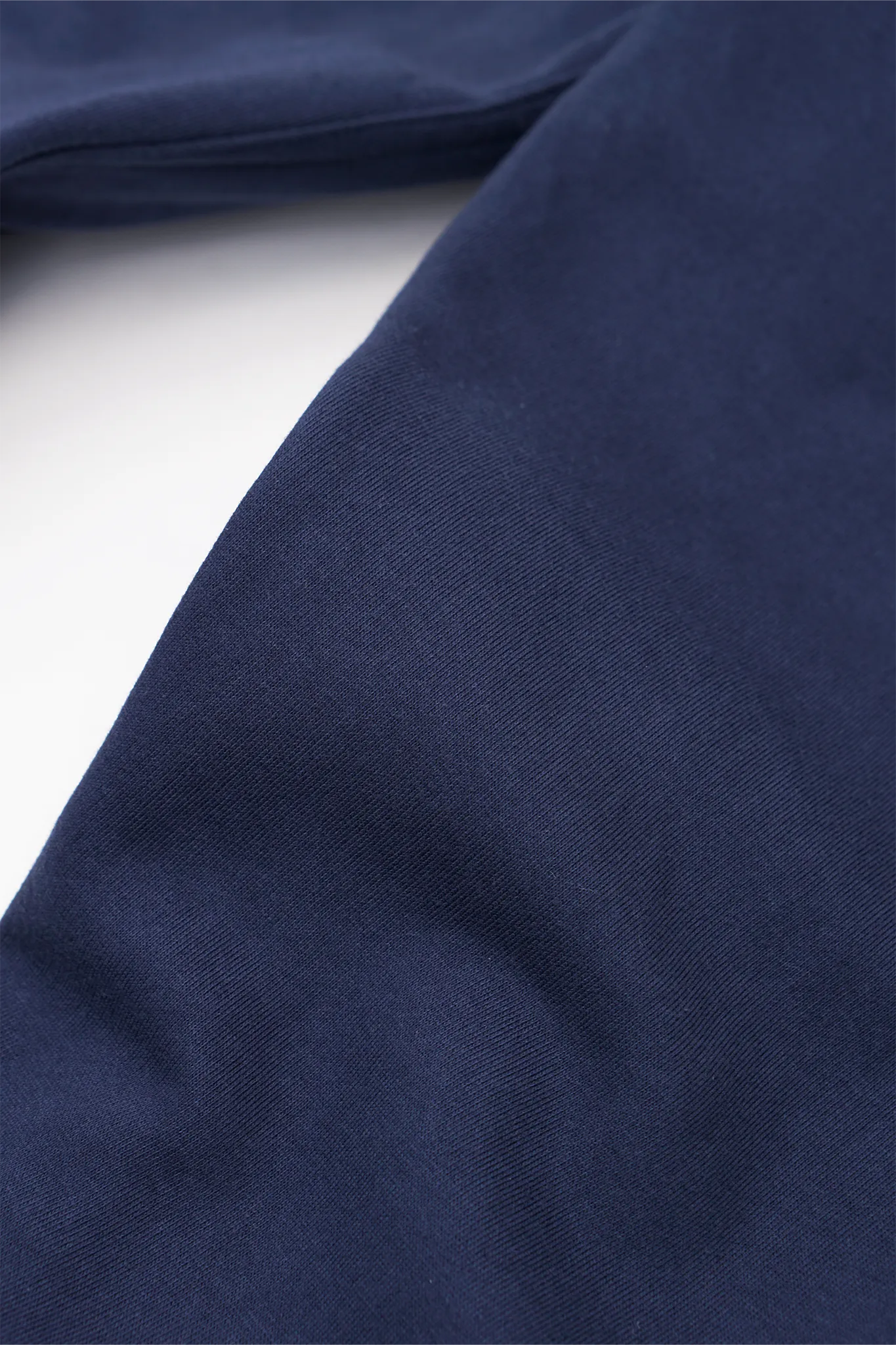 "M'$ & BEYOND" TRACK PANTS IN NAVY BLUE