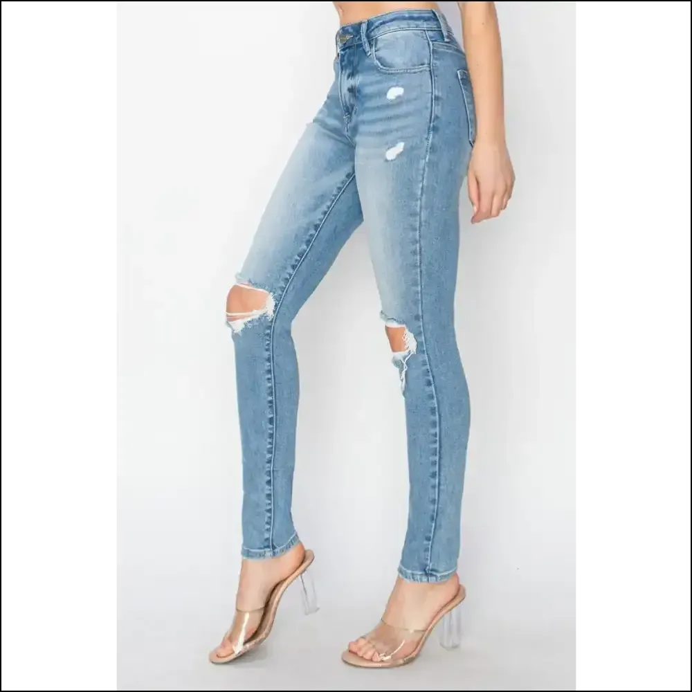 Risen High Rise Distressed Skinny Jeans: Couch Comfort Meets Catwalk Chic!
