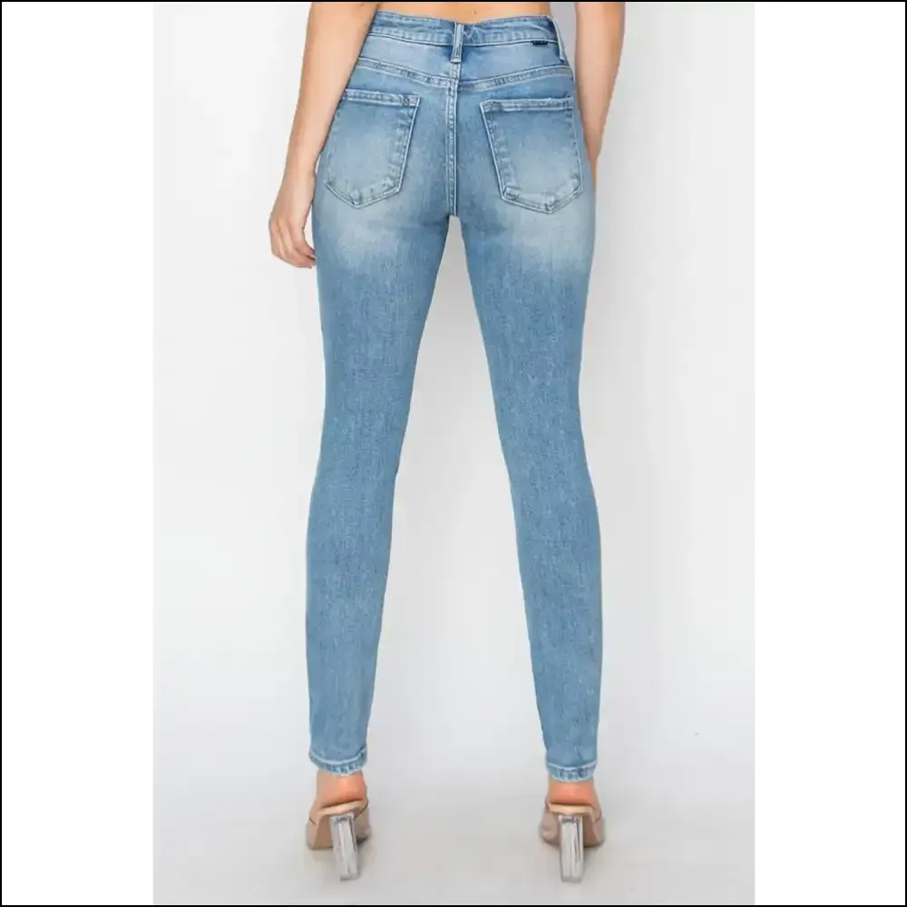 Risen High Rise Distressed Skinny Jeans: Couch Comfort Meets Catwalk Chic!