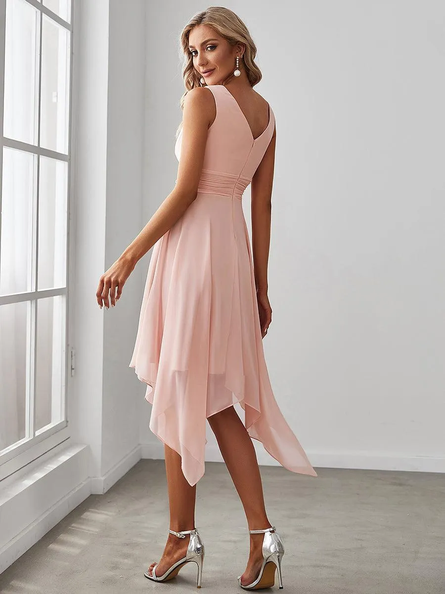 Robe courte en mousseline rose à ourlet irrégulier