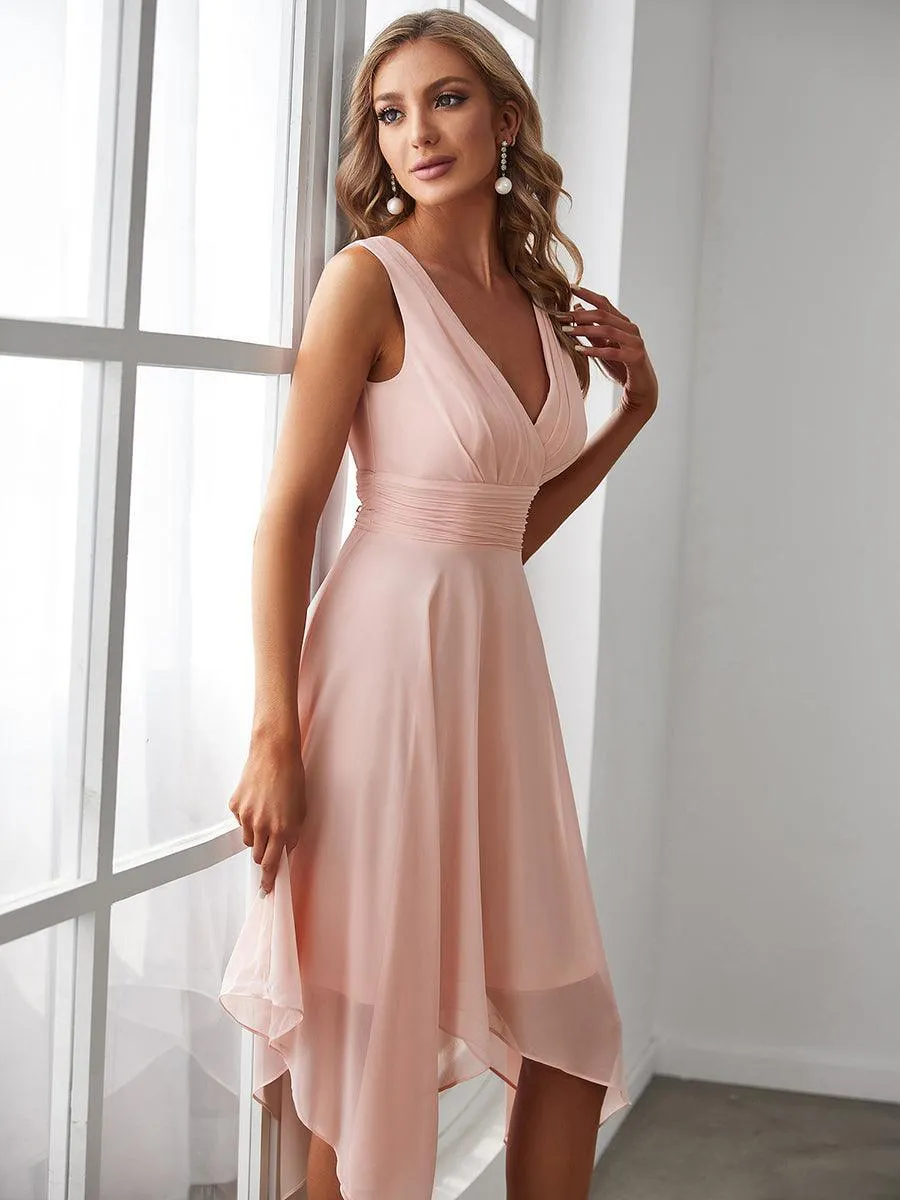 Robe courte en mousseline rose à ourlet irrégulier