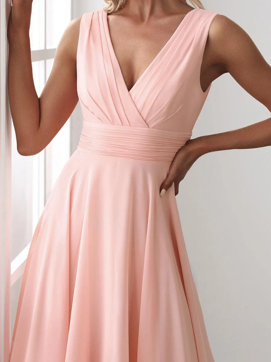 Robe courte en mousseline rose à ourlet irrégulier