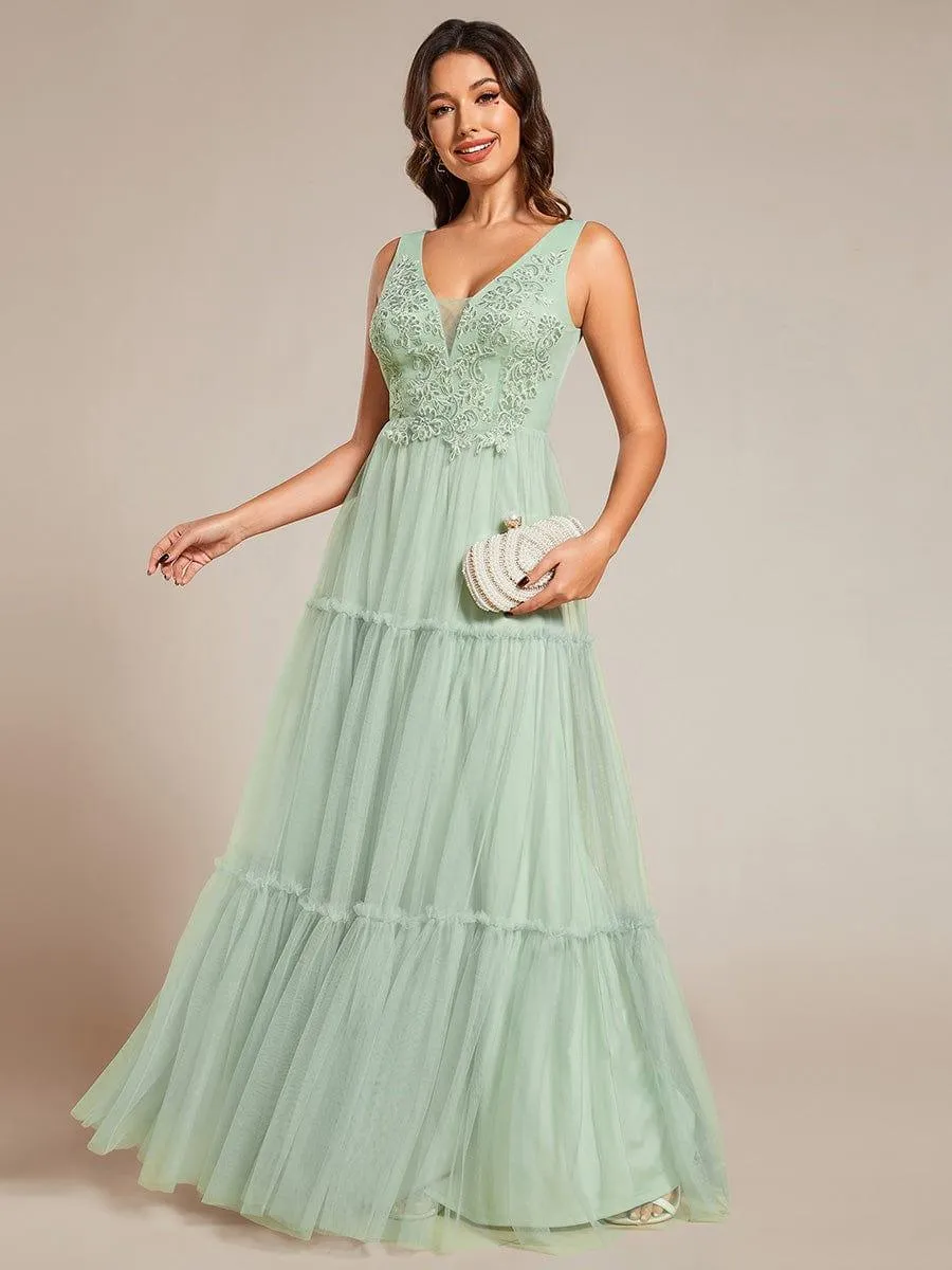 Robe de soirée en tulle transparent sans manches avec appliques