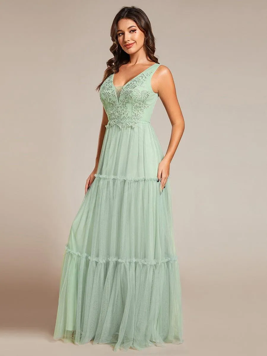 Robe de soirée en tulle transparent sans manches avec appliques