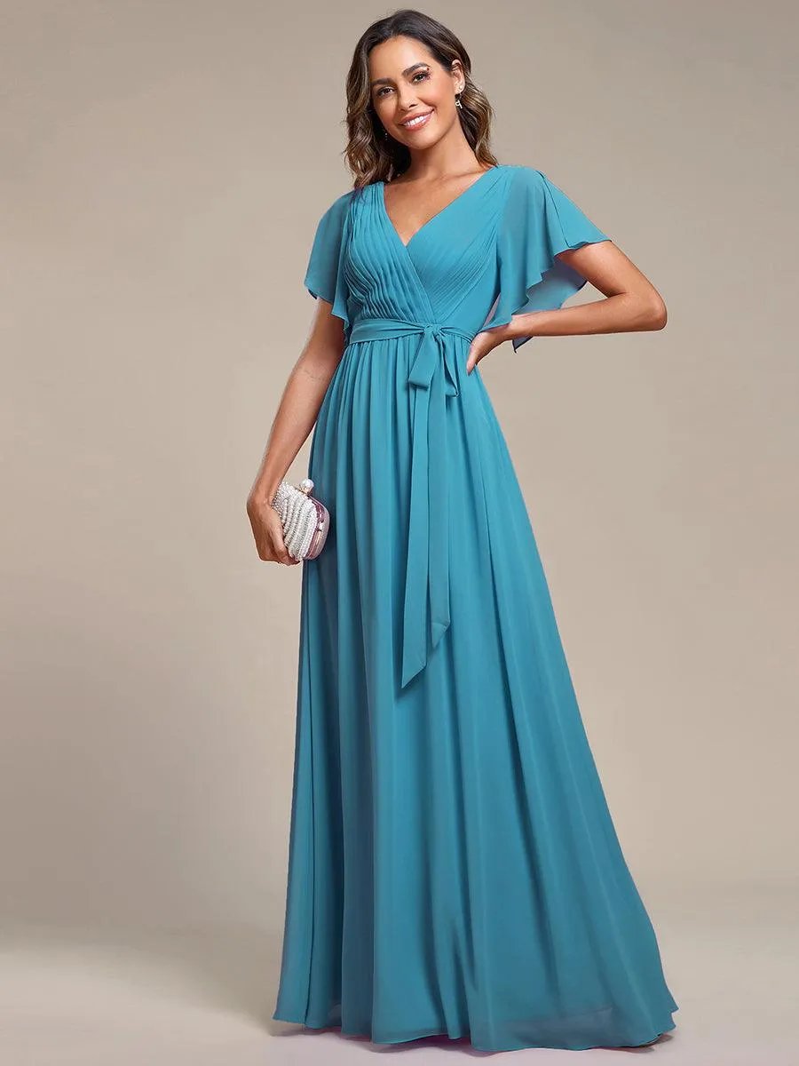 Robe demoiselle d'honneur en mousseline à encolure en V et à manches flottantes