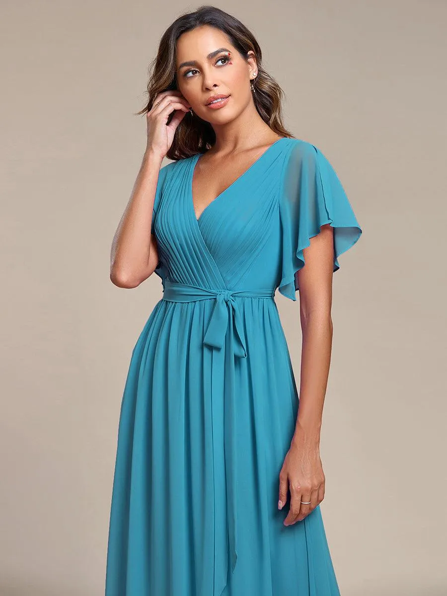 Robe demoiselle d'honneur en mousseline à encolure en V et à manches flottantes